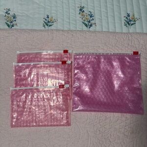 Glossier Set of Pink Zip Pouches